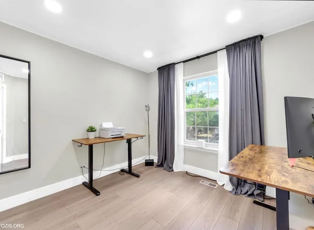 a view of work space with lounge chair