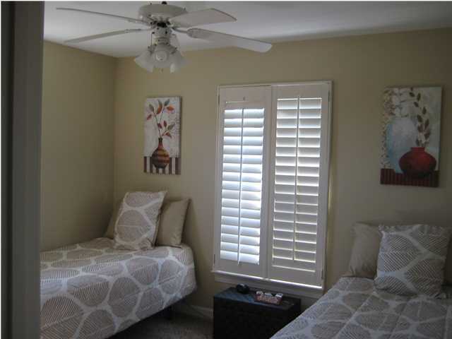 93 Mantero Way Destin, FL 32541 - Photo 14 of 21 a bedroom with a bed and a window