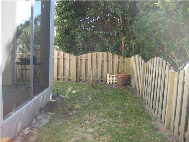93 Mantero Way Destin, FL 32541 - Photo 16 of 21 a house view with garden space