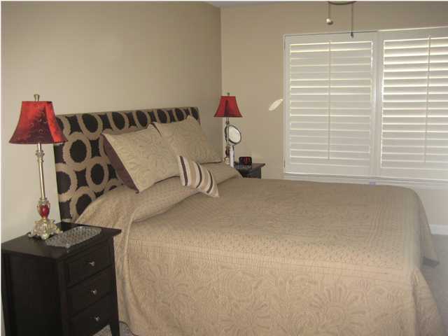 93 Mantero Way Destin, FL 32541 - Photo 10 of 21 a bedroom with a bed and a window