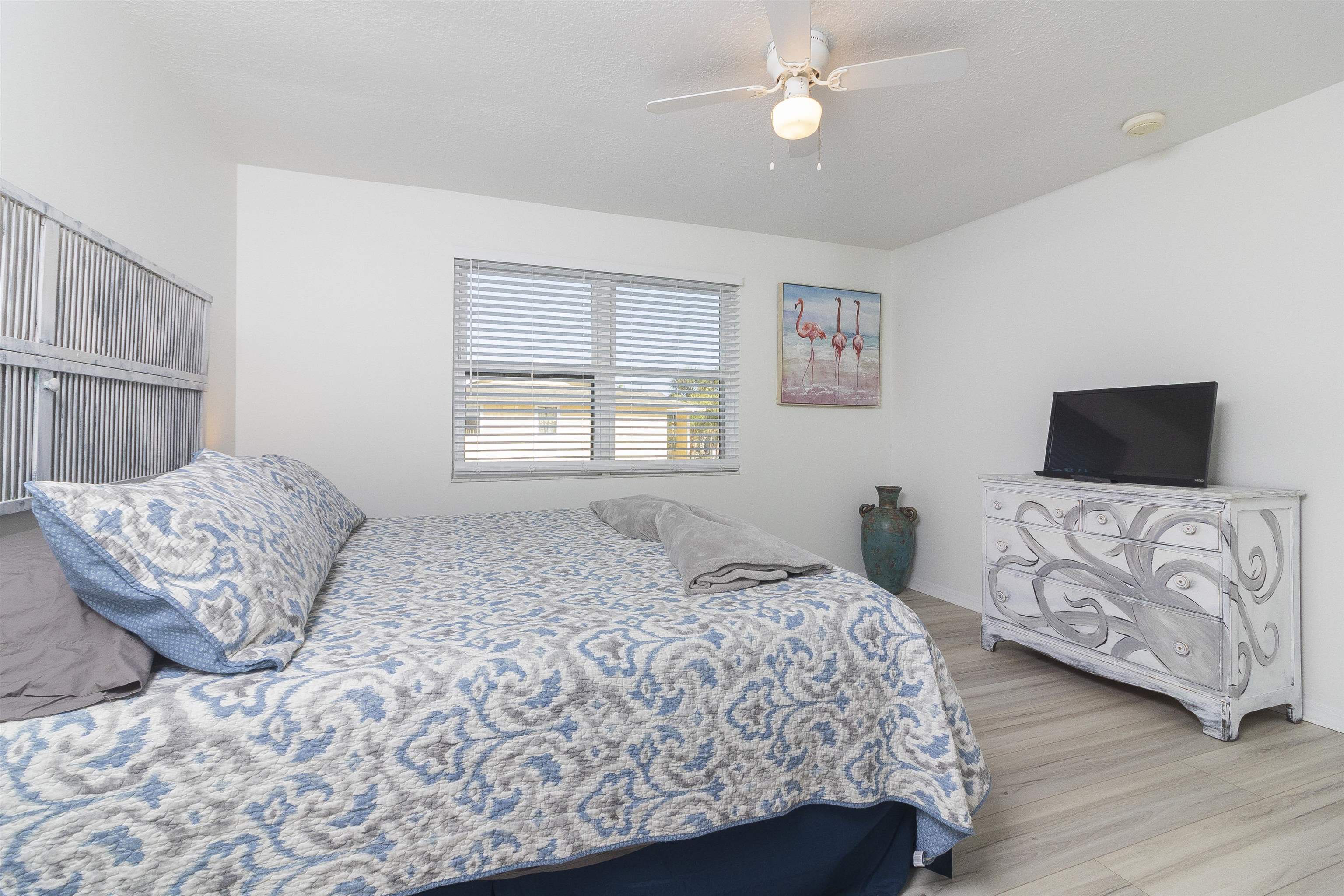 28 Schooner Court, Unit 28 St. Augustine, FL 32080 - Photo 16 of 28 a bedroom with a large bed and a window