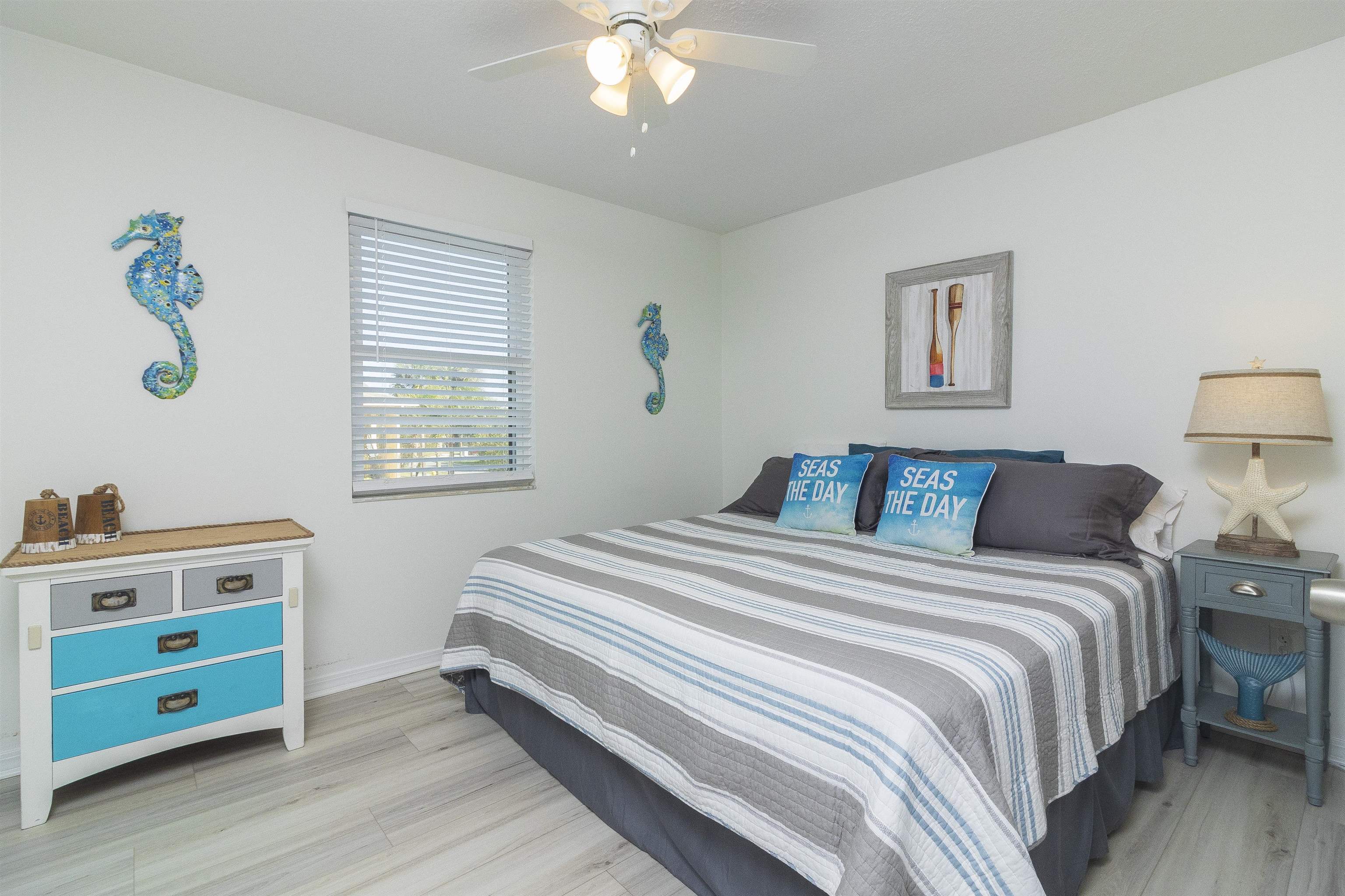 28 Schooner Court, Unit 28 St. Augustine, FL 32080 - Photo 17 of 28 a bedroom with a bed and a window