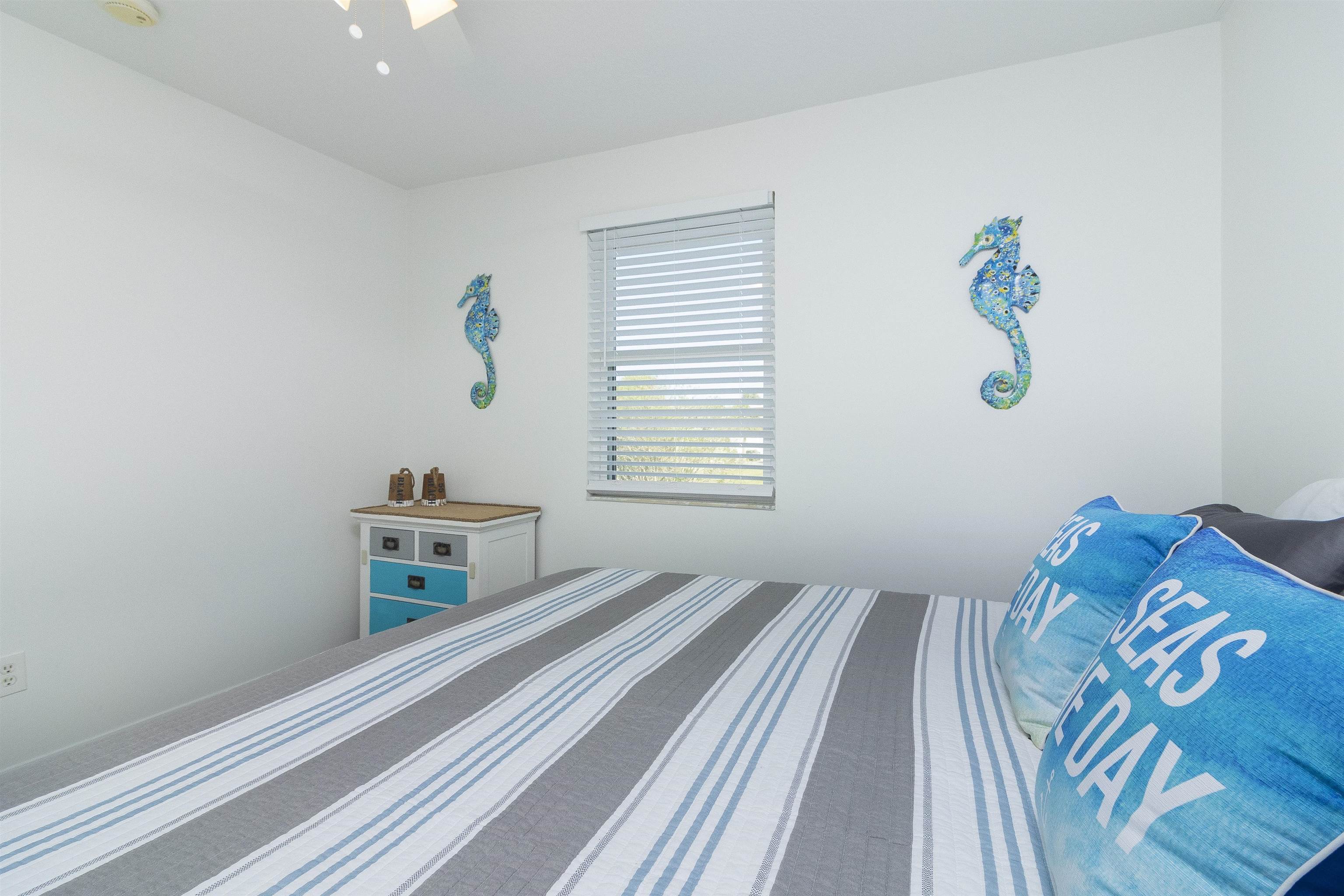 28 Schooner Court, Unit 28 St. Augustine, FL 32080 - Photo 20 of 28 a bedroom with a bed and a window