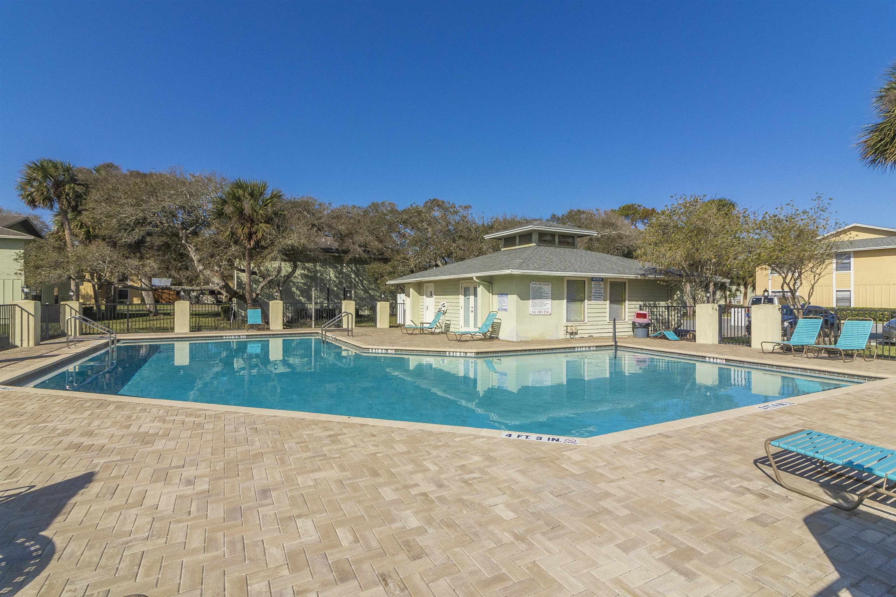 28 Schooner Court, Unit 28 St. Augustine, FL 32080 - Photo 24 of 28 a view of a house with swimming pool and a yard