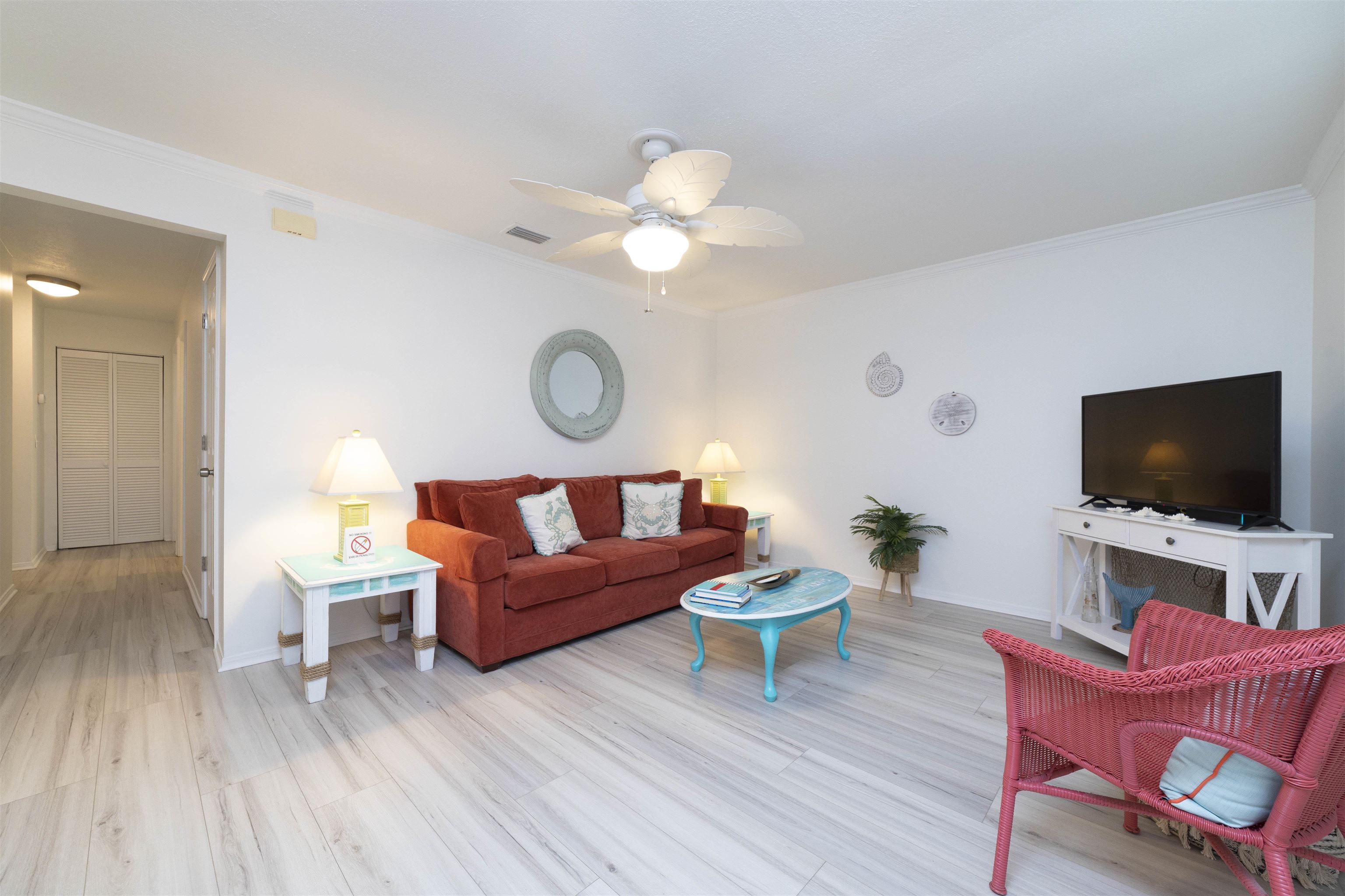 28 Schooner Court, Unit 28 St. Augustine, FL 32080 - Photo 5 of 28 a living room with furniture and a flat screen tv