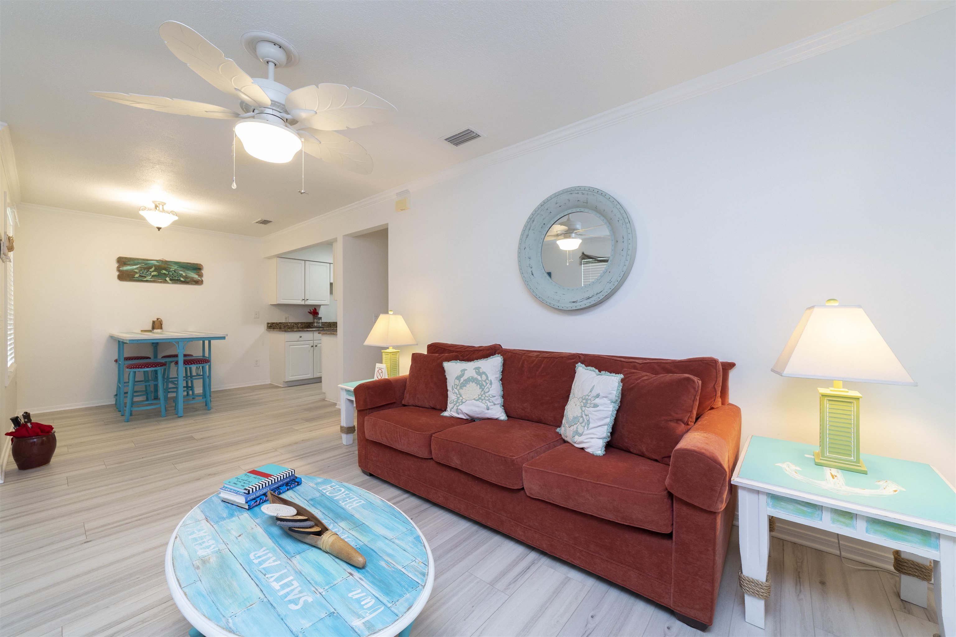 28 Schooner Court, Unit 28 St. Augustine, FL 32080 - Photo 7 of 28 a living room with furniture and a wooden floor