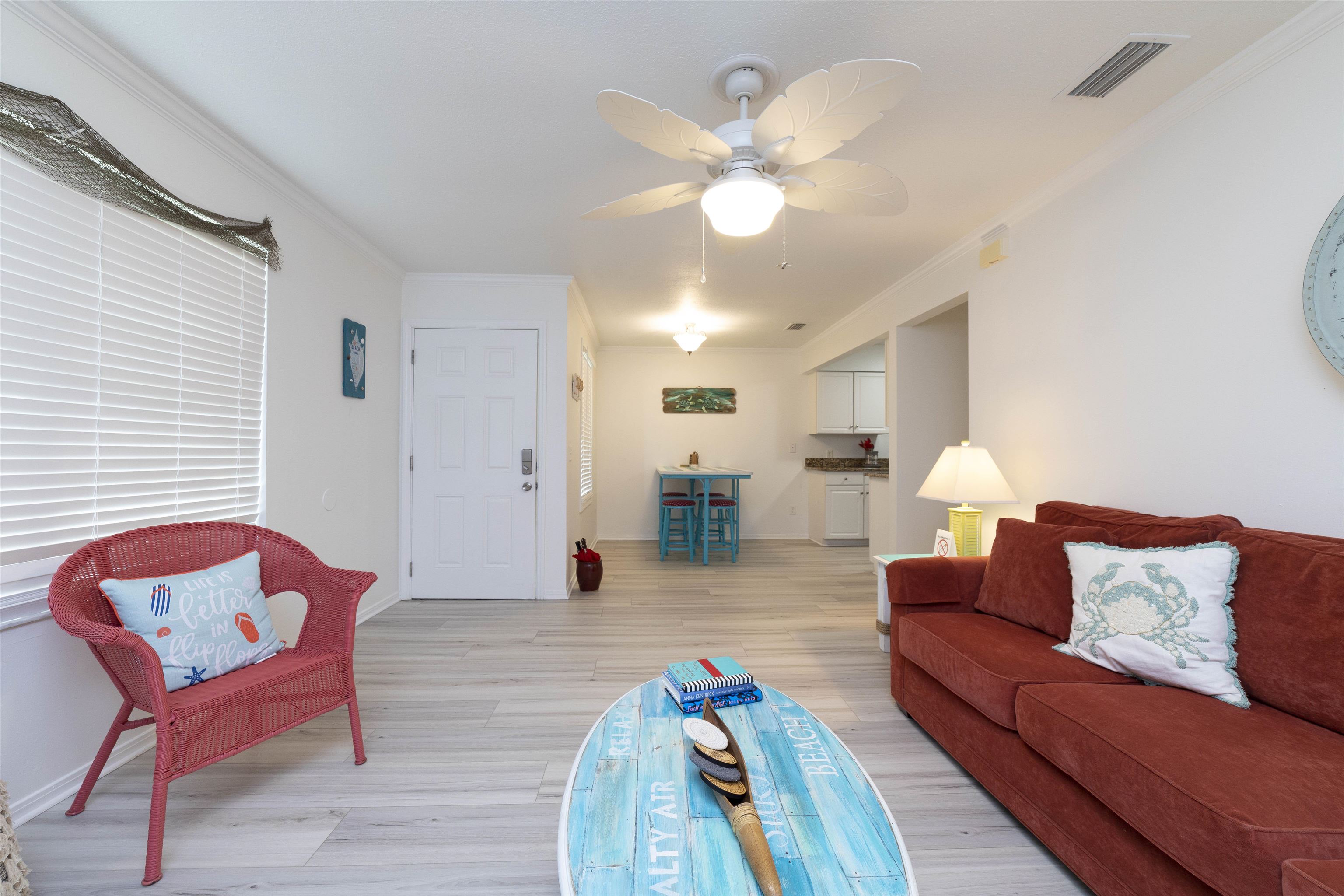 28 Schooner Court, Unit 28 St. Augustine, FL 32080 - Photo 8 of 28 a living room with furniture and wooden floor