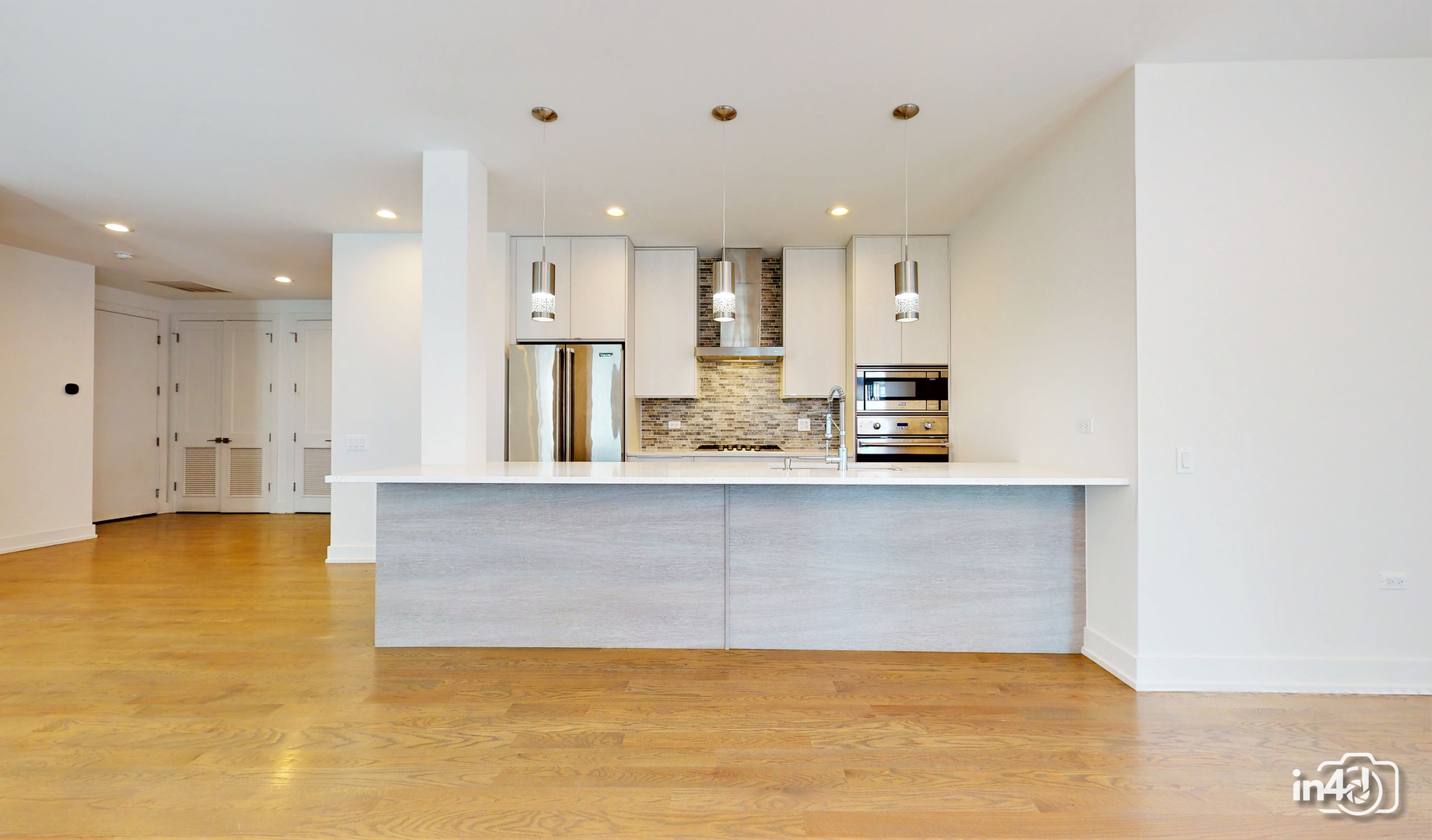 236 South Racine Avenue, Unit 201 Chicago, IL 60607 - Photo 14 of 45 a view of kitchen and kitchen with granite countertop cabinets