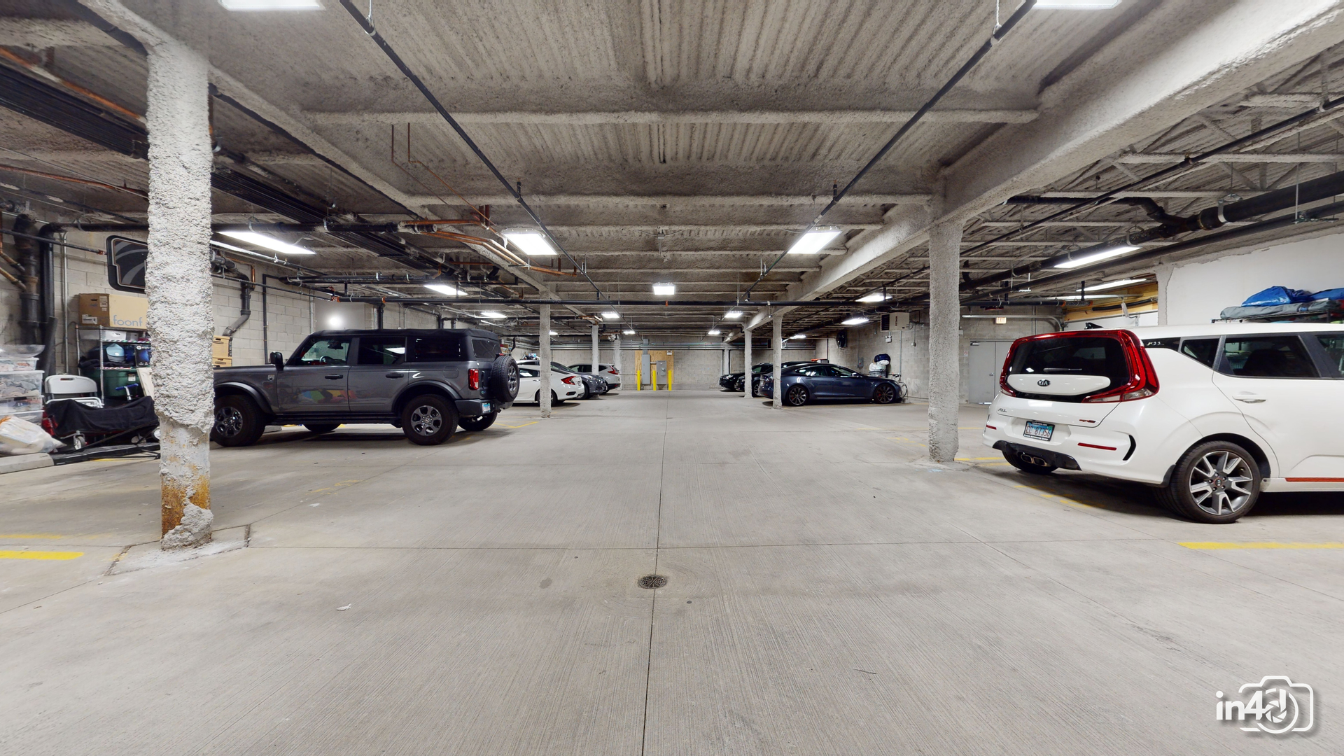 236 South Racine Avenue, Unit 201 Chicago, IL 60607 - Photo 24 of 45 a view of parking garage with cars