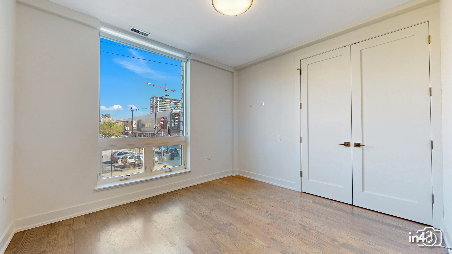 236 South Racine Avenue, Unit 201 Chicago, IL 60607 - Photo 26 of 45 a view of an entryway with wooden floor