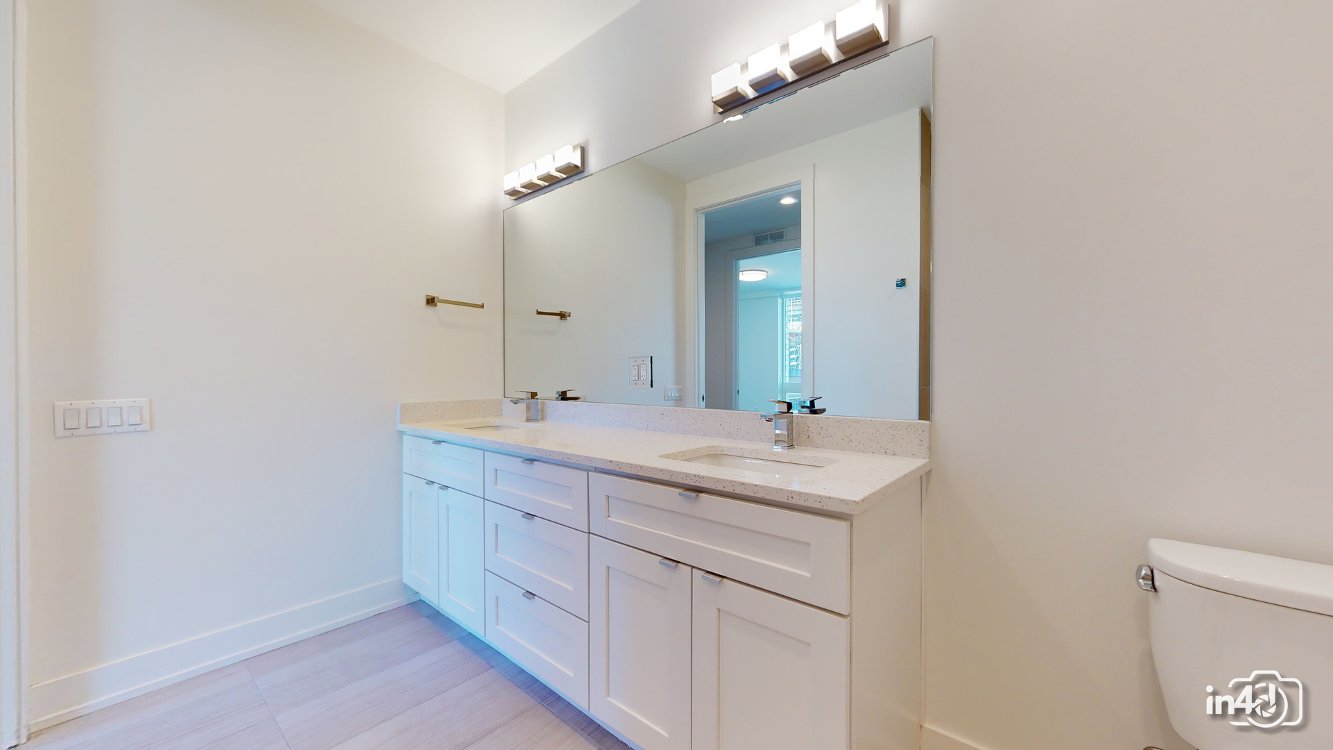 236 South Racine Avenue, Unit 201 Chicago, IL 60607 - Photo 30 of 45 a bathroom with a sink and a mirror