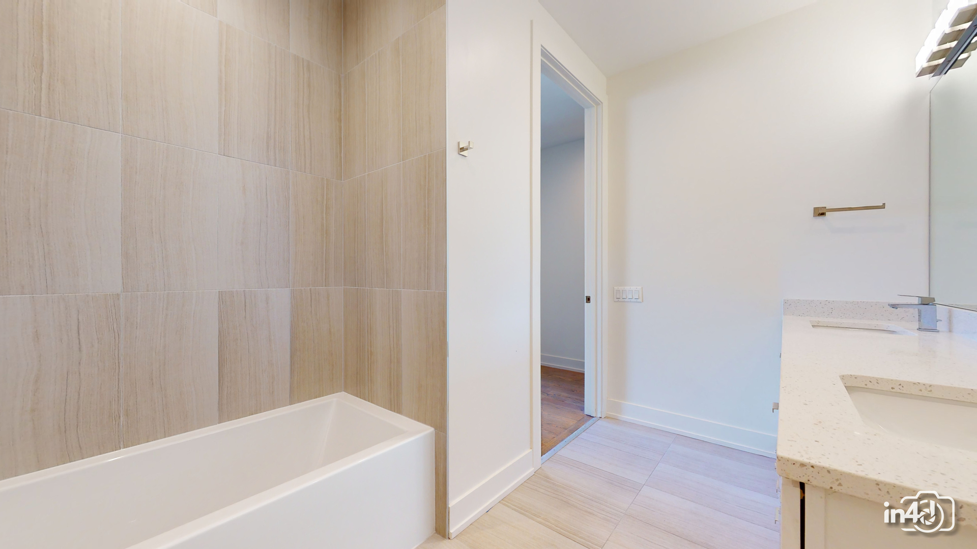 236 South Racine Avenue, Unit 201 Chicago, IL 60607 - Photo 31 of 45 a bathroom with a bathtub and a sink