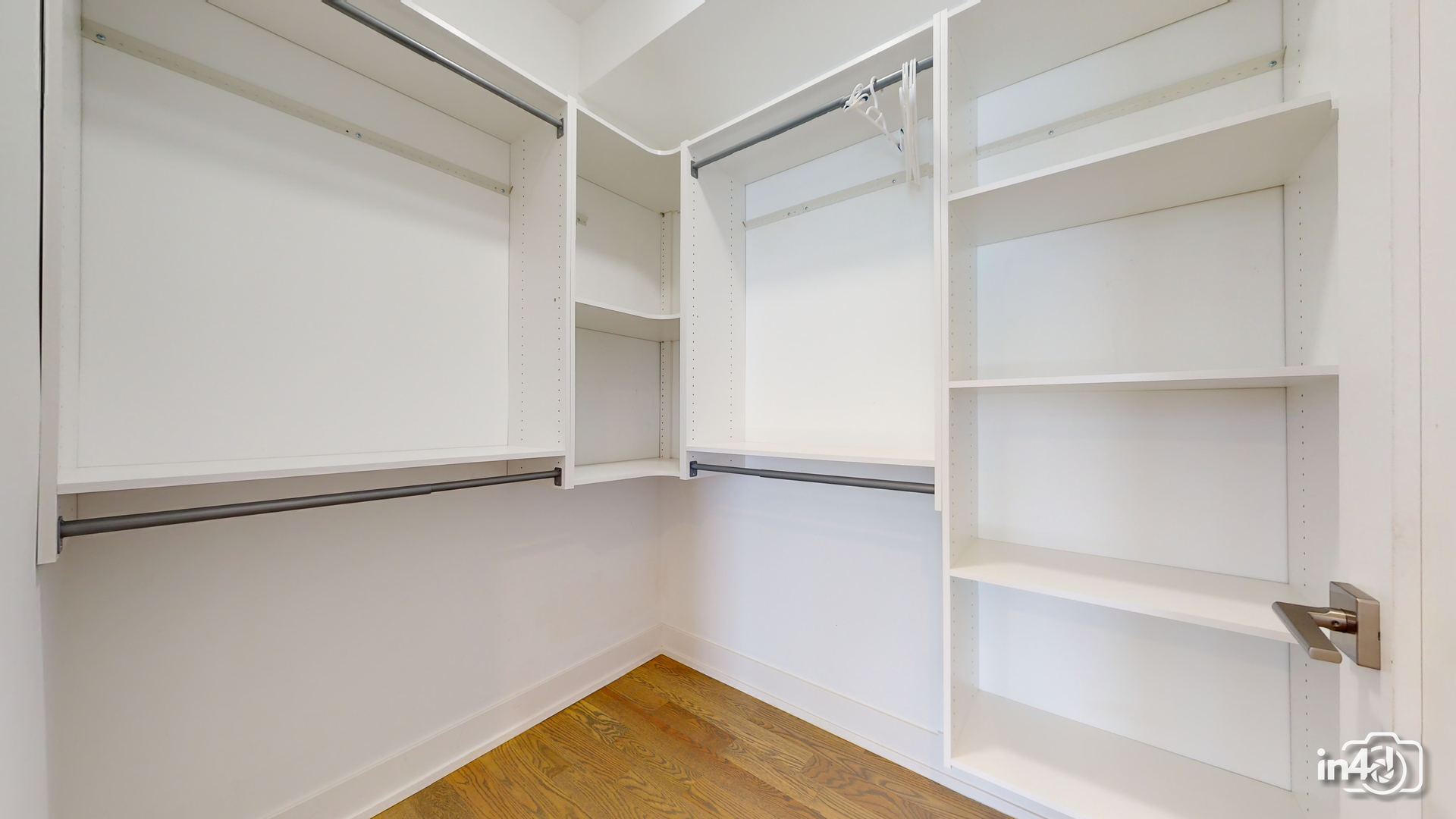 236 South Racine Avenue, Unit 201 Chicago, IL 60607 - Photo 42 of 45 a view of an empty walk in closet