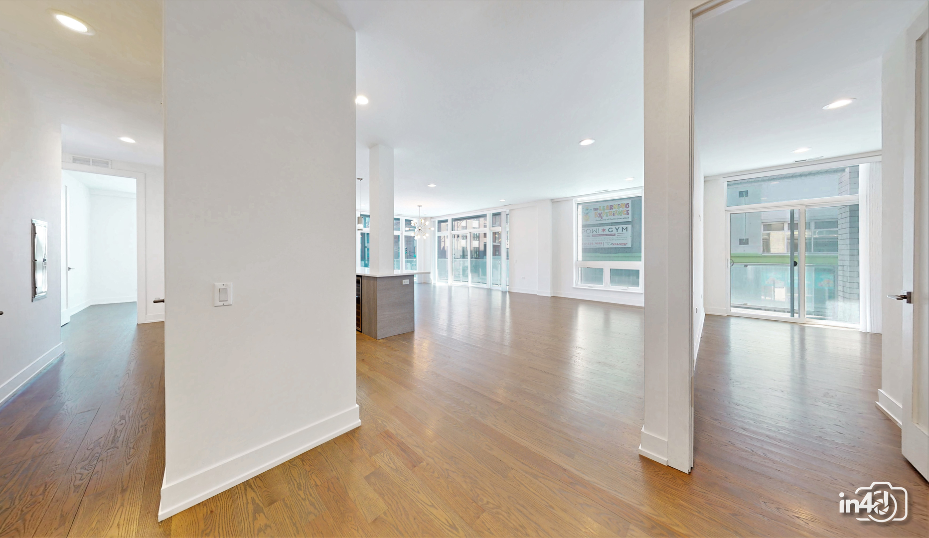 236 South Racine Avenue, Unit 201 Chicago, IL 60607 - Photo 43 of 45 a view of a hallway with wooden floor