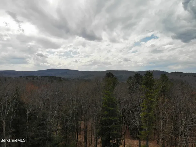 a view of mountain with lake