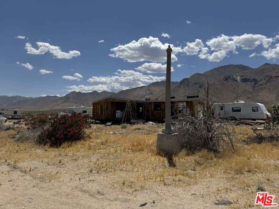 401 Sterling Road Inyokern, CA 93527 - Photo 27 of 37 a view of a house with a yard