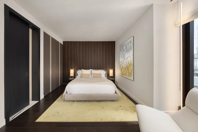 a view of living room with furniture and a flat screen tv