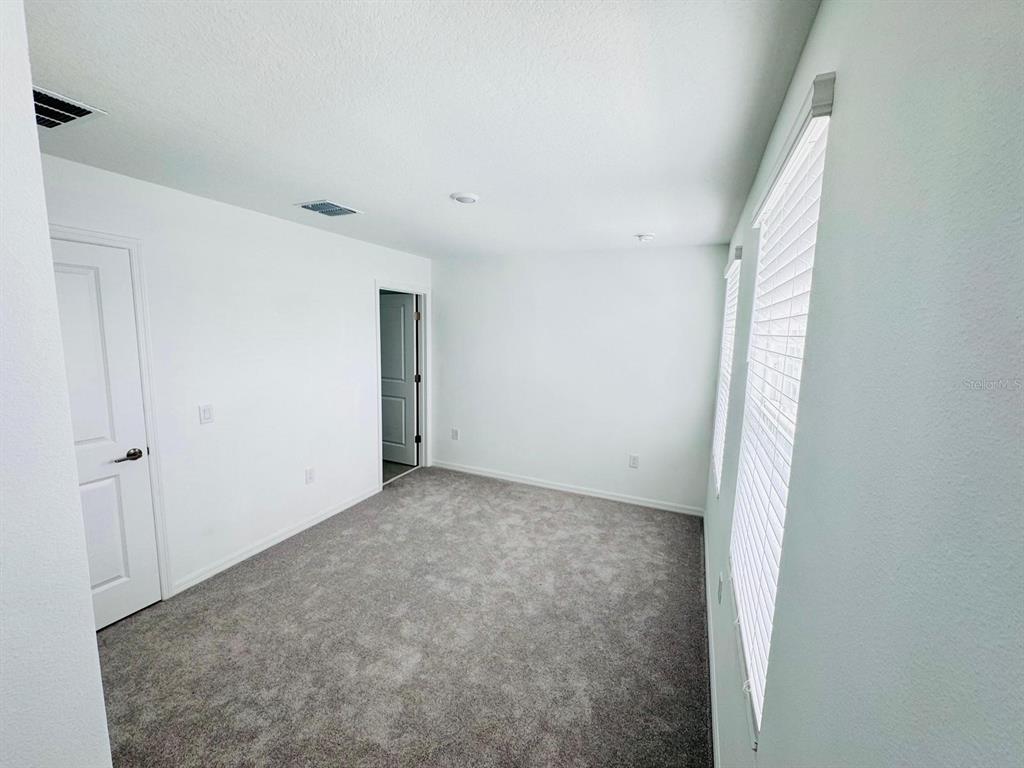 3140 Skyline Loop Kissimmee, FL 34758 - Photo 12 of 27 a view of an empty room