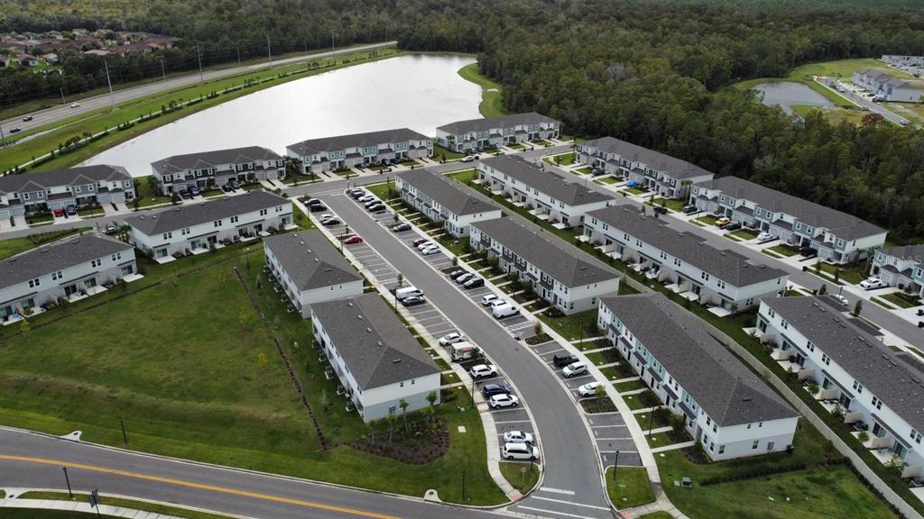 3140 Skyline Loop Kissimmee, FL 34758 - Photo 2 of 27 an aerial view of a city