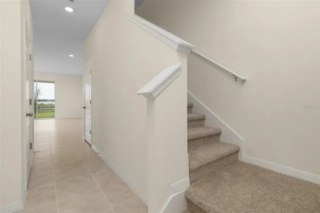 a view of hallway with stairs