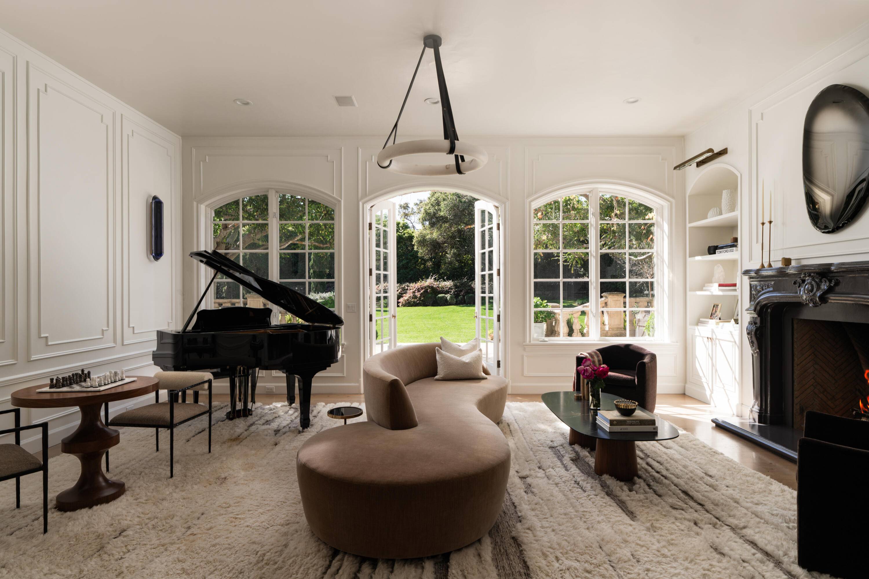 1567 East Valley Road Montecito, CA 93108 - Photo 3 of 34 a living room with furniture a window and a chandelier
