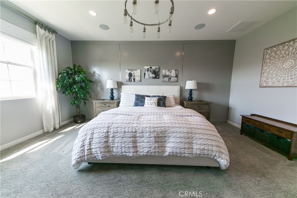 308 Finch Lake Forest, CA 92630 - Photo 14 of 35 a bedroom with a bed and window