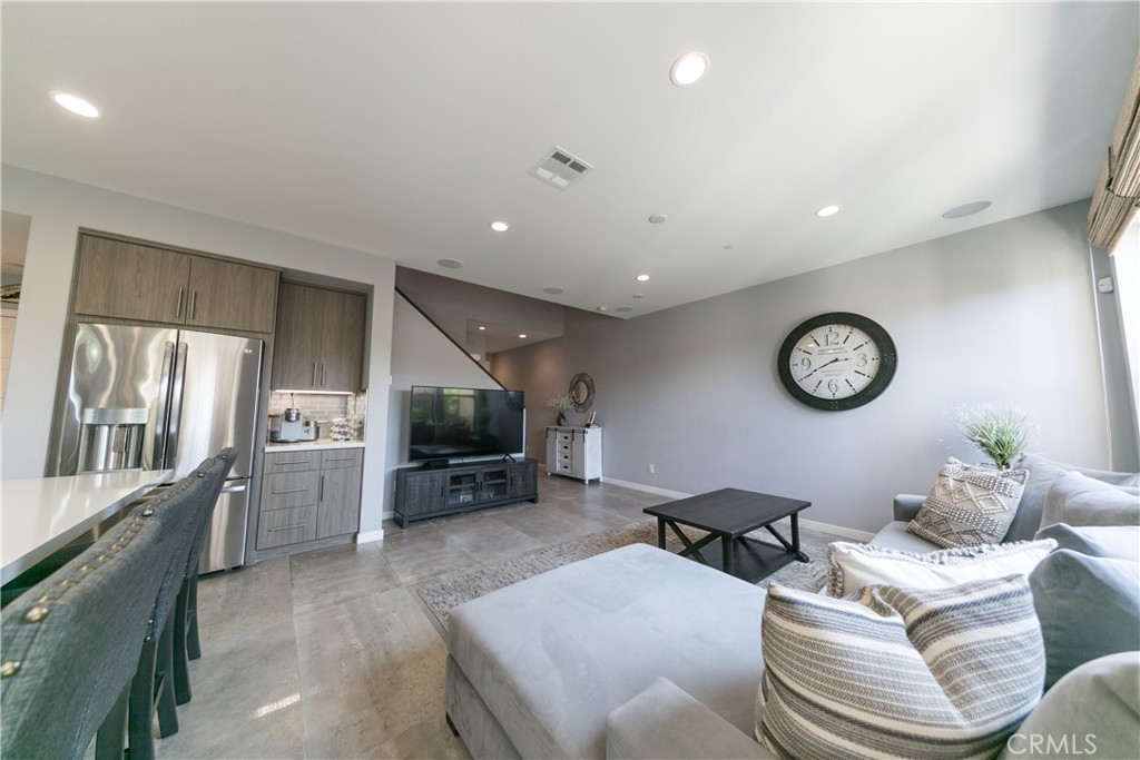 308 Finch Lake Forest, CA 92630 - Photo 2 of 35 a living room with furniture and a flat screen tv