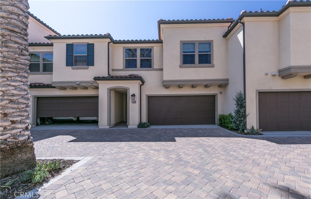 308 Finch Lake Forest, CA 92630 - Photo 24 of 35 a front view of a house with a yard and garage