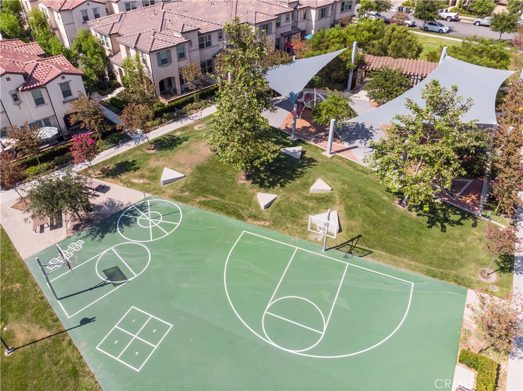 308 Finch Lake Forest, CA 92630 - Photo 28 of 35 an aerial view of a tennis ground and large trees