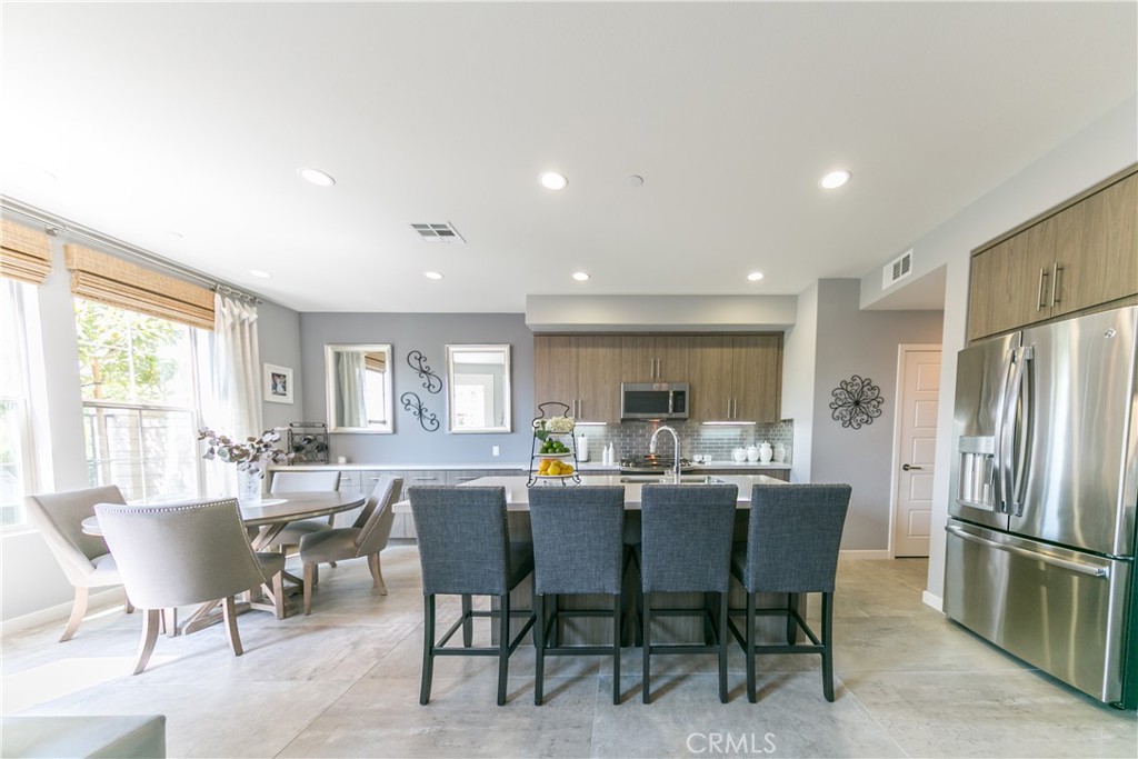 308 Finch Lake Forest, CA 92630 - Photo 5 of 35 a view of a dining room with furniture window and outside view