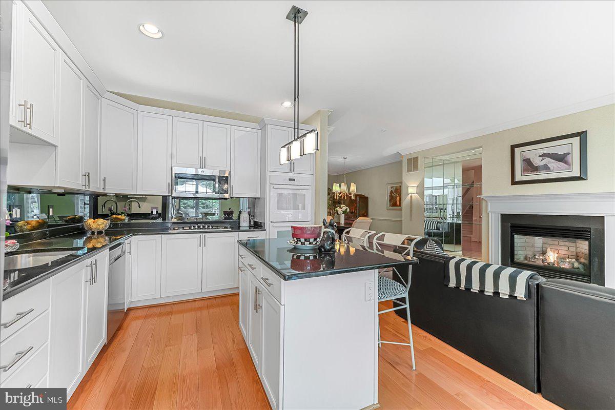 1132 Brian's Way Wayne, PA 19087 - Photo 11 of 45 a kitchen with counter top space a sink cabinets and appliances