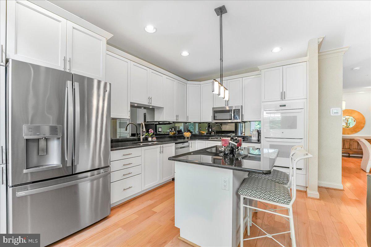1132 Brian's Way Wayne, PA 19087 - Photo 13 of 45 a kitchen with stainless steel appliances a refrigerator sink and microwave