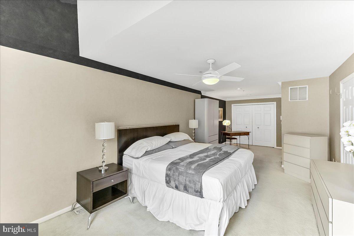 1132 Brian's Way Wayne, PA 19087 - Photo 23 of 45 a bedroom with a bed and a potted plant