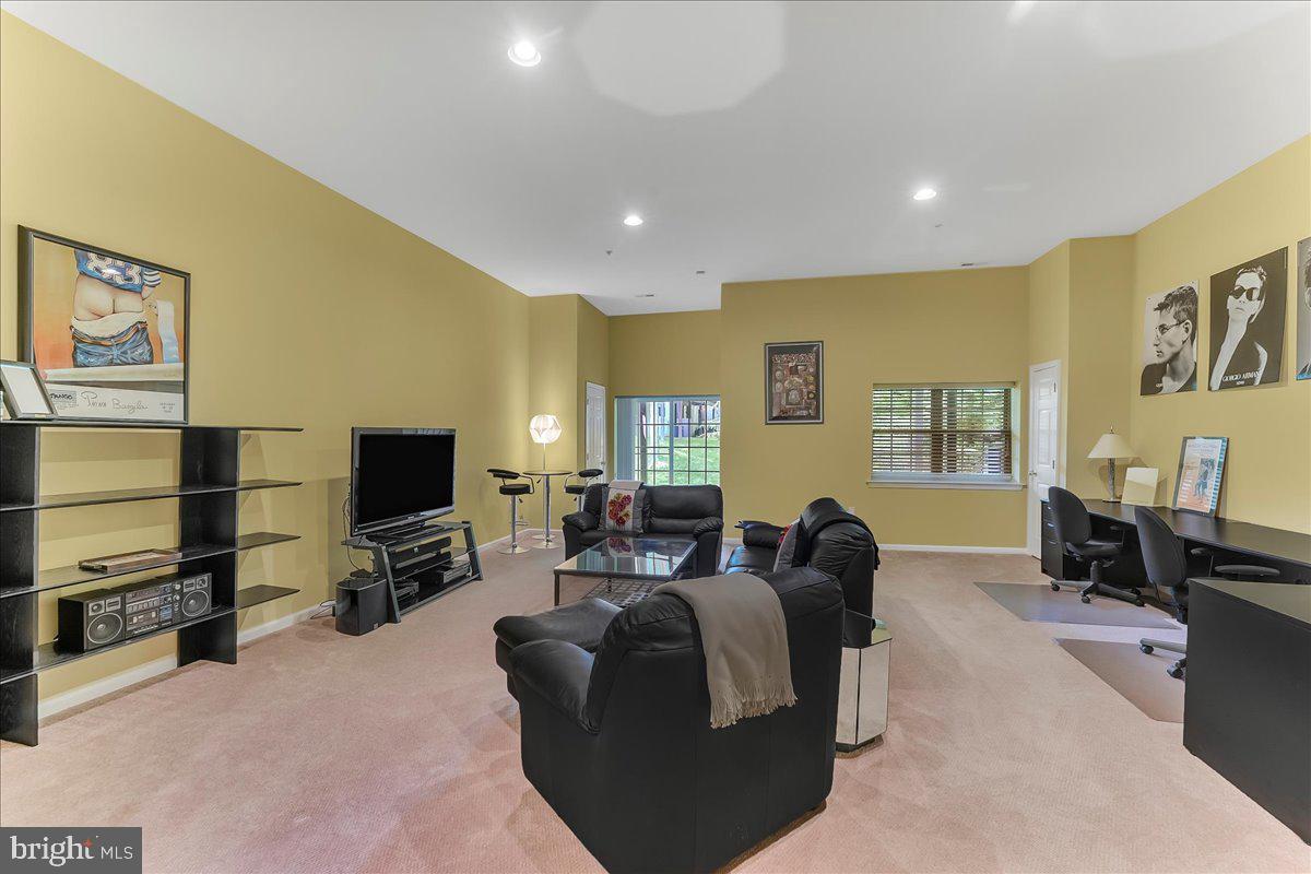 1132 Brian's Way Wayne, PA 19087 - Photo 37 of 45 a living room with furniture and a flat screen tv