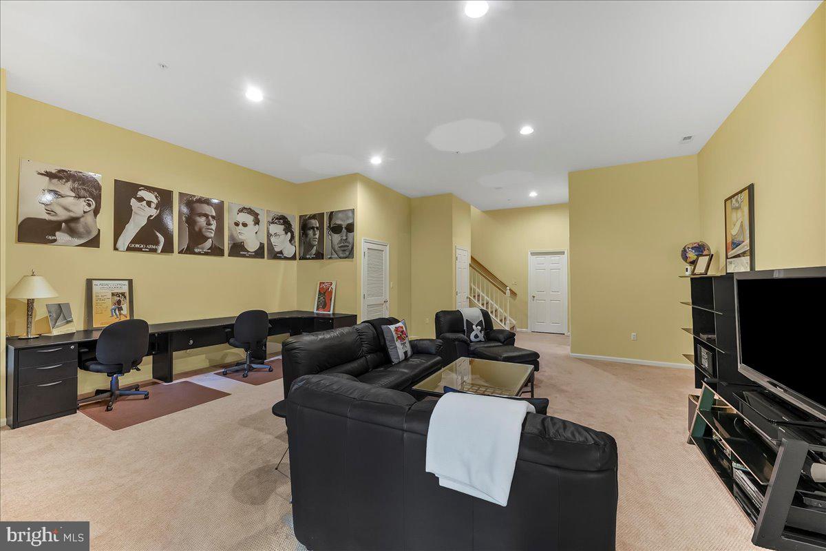 1132 Brian's Way Wayne, PA 19087 - Photo 39 of 45 a living room with furniture and a flat screen tv