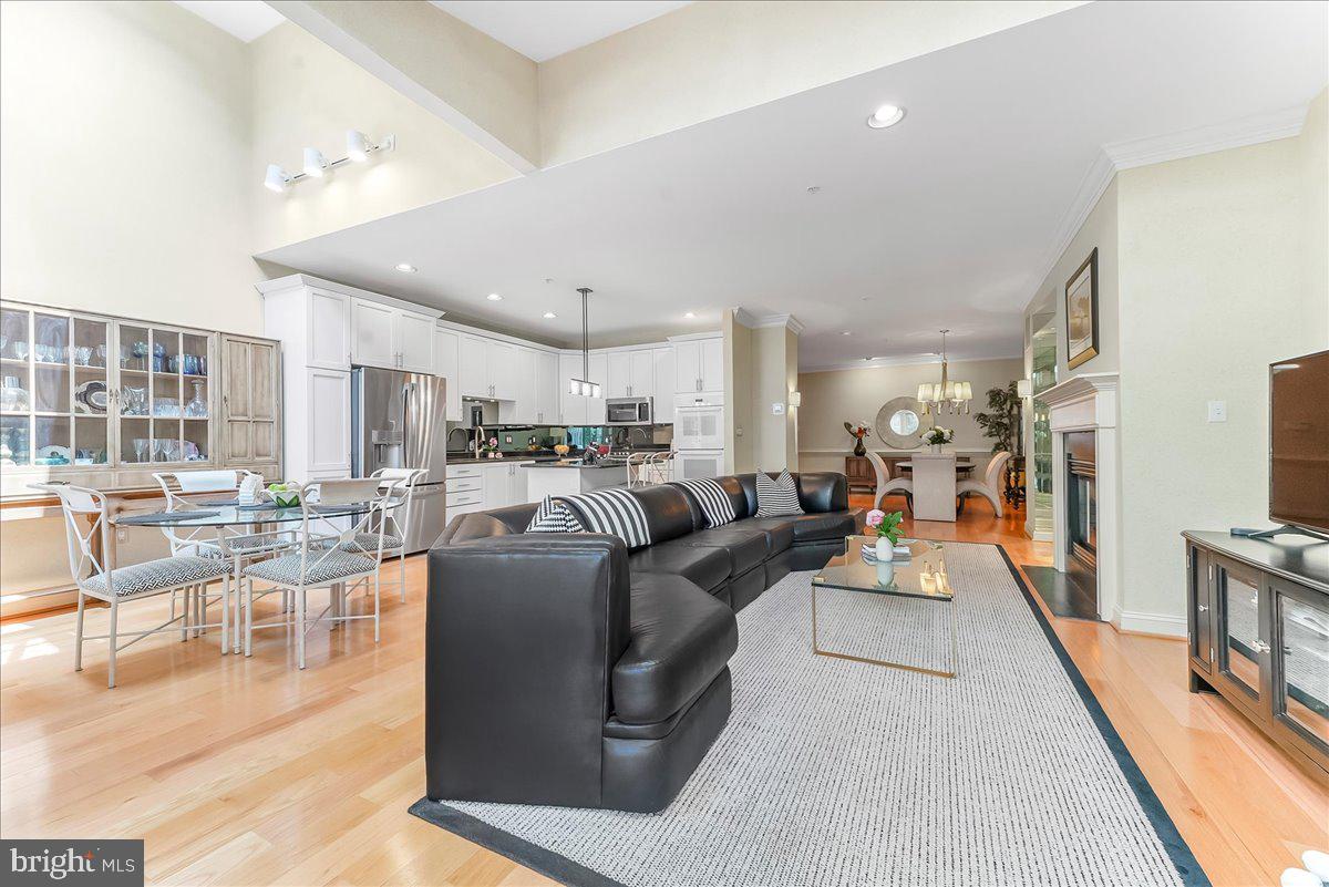 1132 Brian's Way Wayne, PA 19087 - Photo 8 of 45 a living room with lots of furniture and a wooden floor