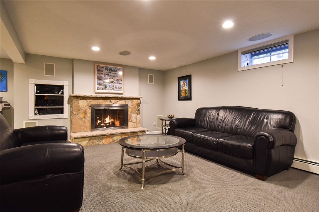 5 Colony Drive Johnston, RI 02919 - Photo 36 of 50 Lower level family room with fireplace