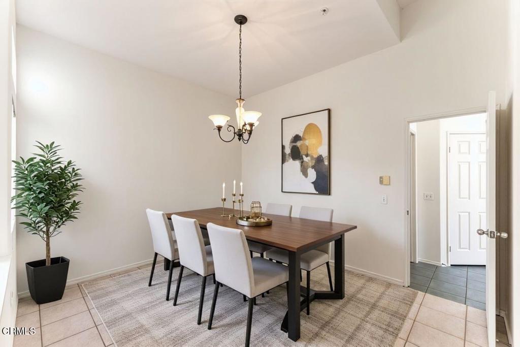 408 Grande Street Oxnard, CA 93036 - Photo 11 of 45 a view of a dining room with furniture and chandelier
