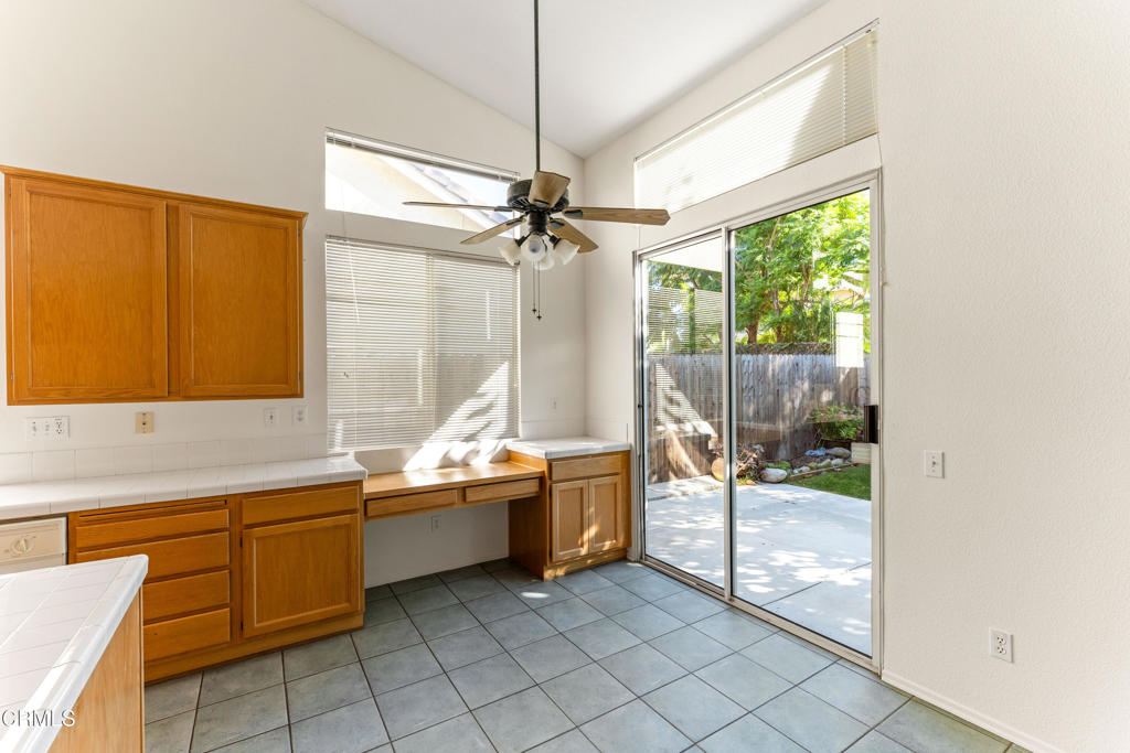 408 Grande Street Oxnard, CA 93036 - Photo 14 of 45 a room with a bed and a chandelier