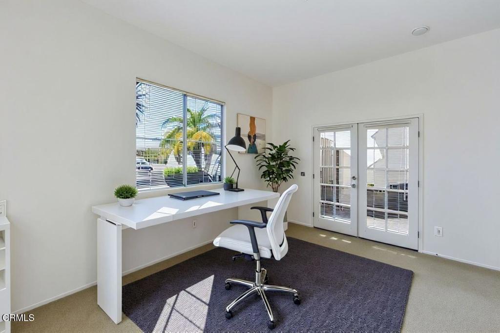 408 Grande Street Oxnard, CA 93036 - Photo 27 of 45 a view of a workspace with furniture and a potted plant