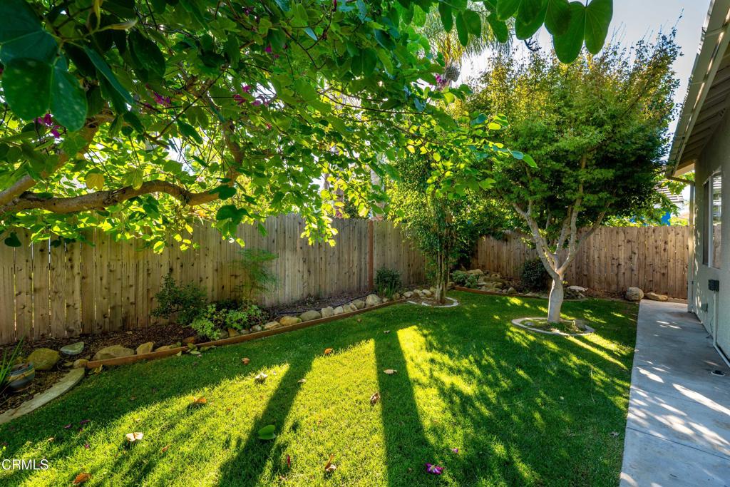 408 Grande Street Oxnard, CA 93036 - Photo 35 of 45 a view of backyard with wooden fence