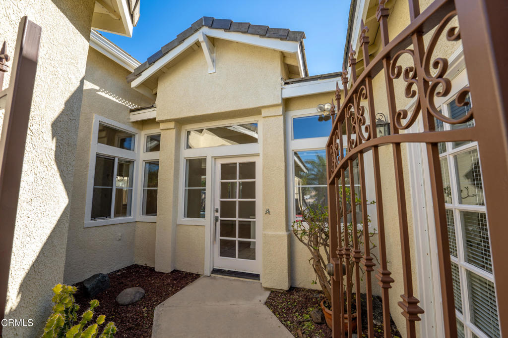 408 Grande Street Oxnard, CA 93036 - Photo 4 of 45 a view of a house with a door and a window