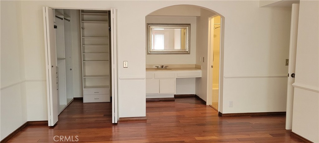 4640 Eastbourne Oxnard, CA 93035 - Photo 11 of 25 Primary bathroom vanity area and walk in closet