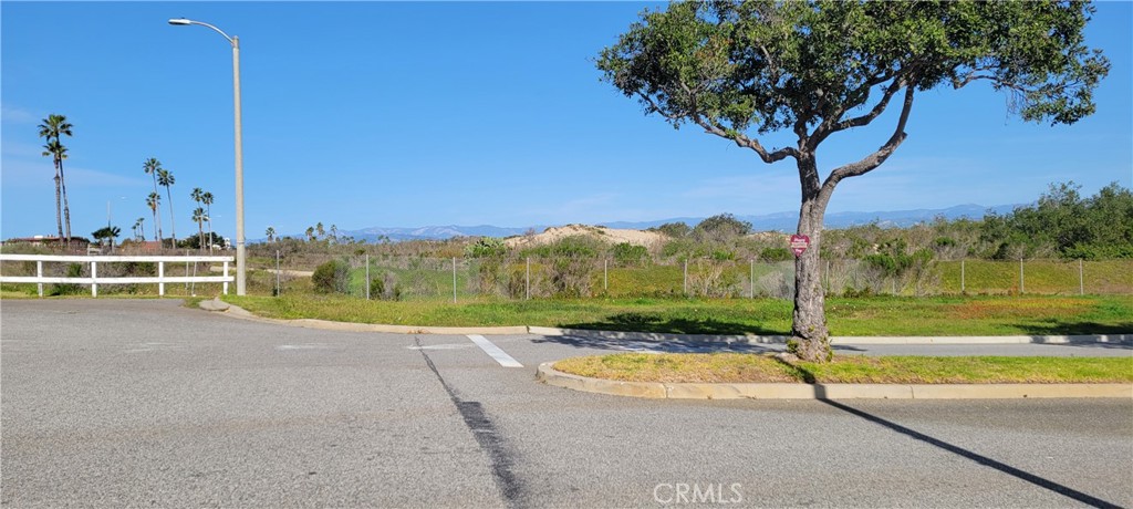 4640 Eastbourne Oxnard, CA 93035 - Photo 21 of 25 From driveway looking at the dunes
