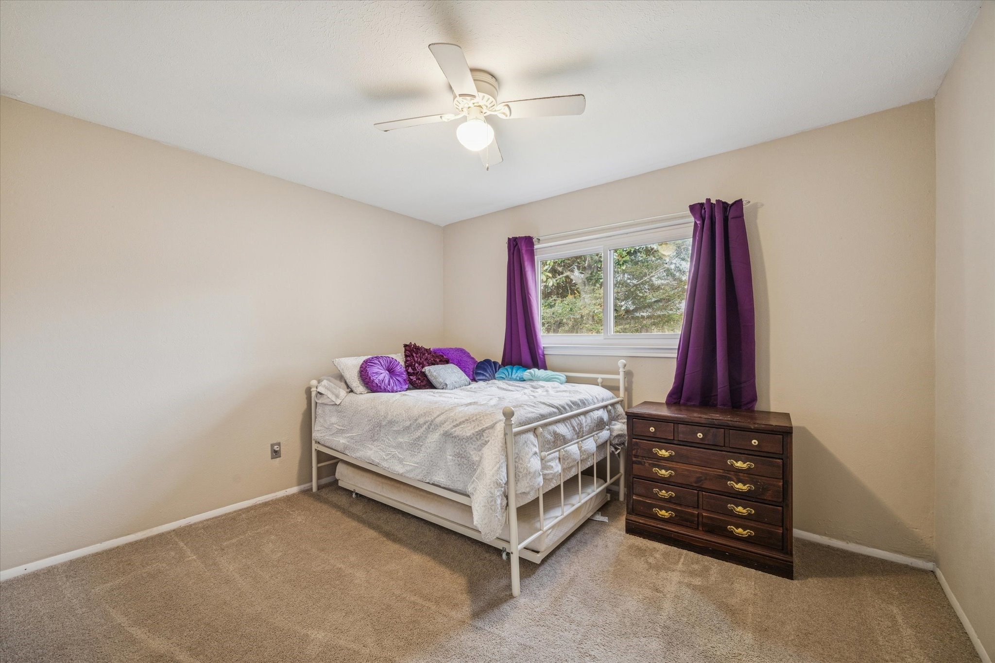 3902 Broken Elm Drive Spring, TX 77388 - Photo 13 of 19 a bedroom with a bed and a window