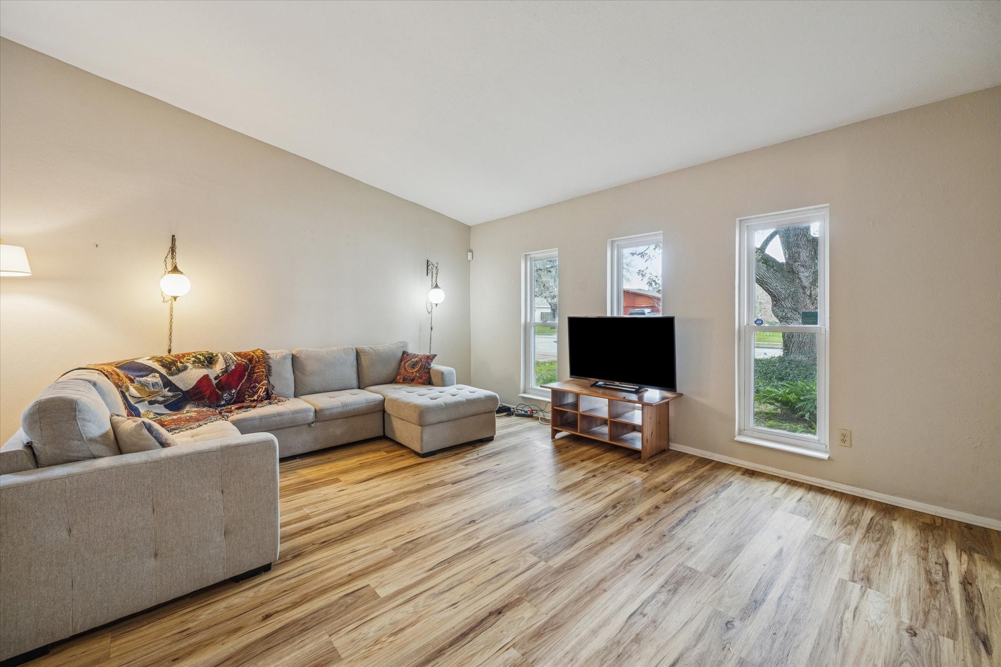 3902 Broken Elm Drive Spring, TX 77388 - Photo 3 of 19 a living room with furniture and a flat screen tv