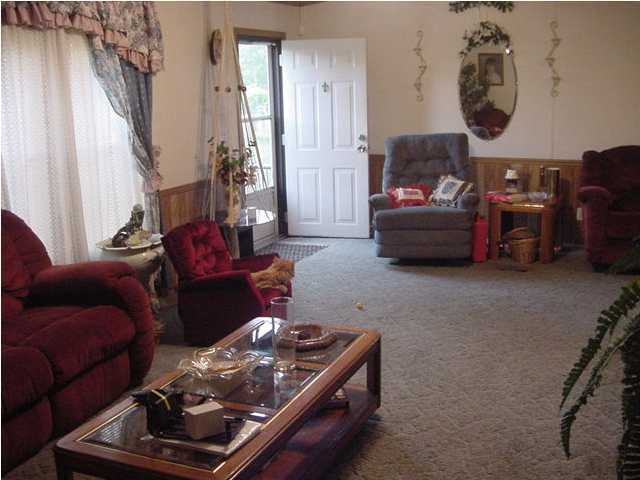 1440 Laird Road Crestview, FL 32539 - Photo 4 of 9 a living room with furniture and a window