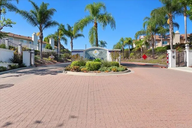 a view of swimming pool with outdoor seating and plants