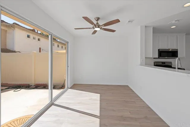 a view of a livingroom with a flat screen tv