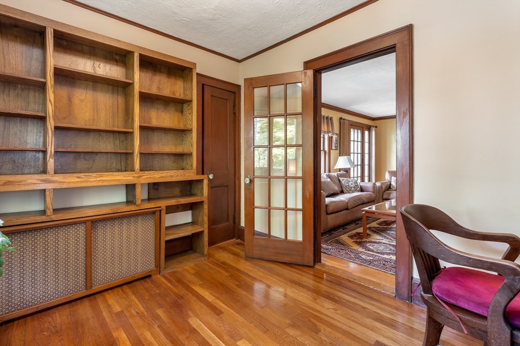 12 Grandview Road Arlington, MA 02476 - Photo 20 of 42 a room with furniture wooden floor and a window